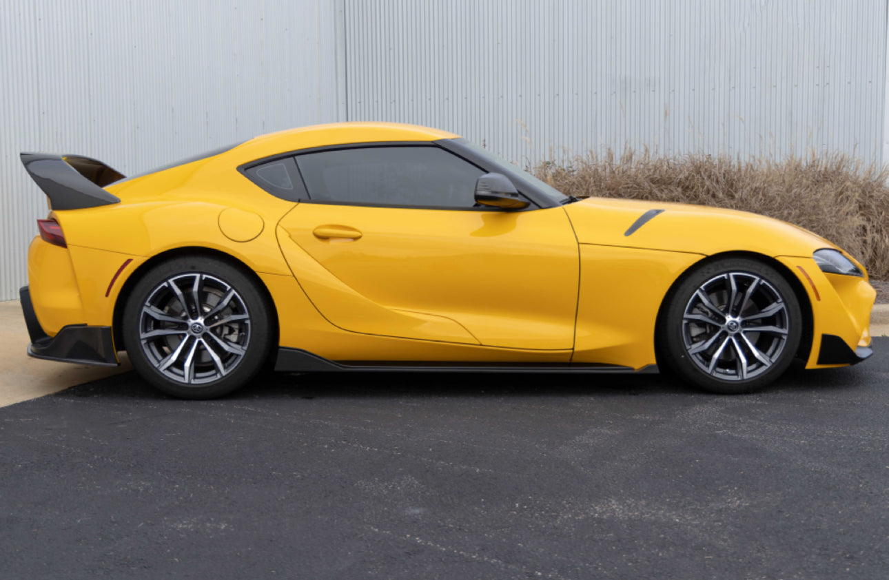 Taloneras de carbono Dinan Toyota Supra Mk5 2020/25